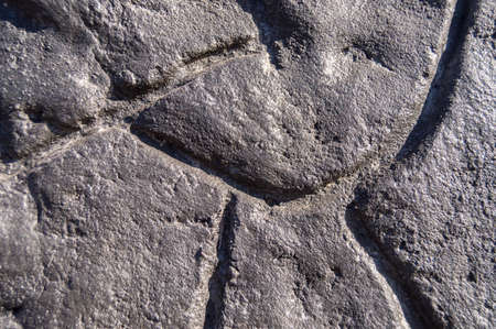Background with lava stones of many colors in Santa Cruz on the island of Tenerifeの写真素材