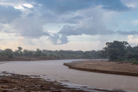 Thunderstorm on the Ewaso Ng'iro River in the savannah of Samburu Park in central Kenyaの写真素材