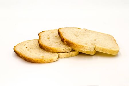 Wheat bread with bran slice. Cooking the dough. Isolated on white background.の写真素材