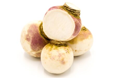 Freshly harvested spring turnips (Brassica rapa) on white backgroundの写真素材