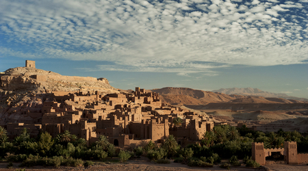 Morocco's fortified town or ksar of Ait Benhaddou; its earthen-clay architecture catching the golden light of sunrise.のeditorial素材