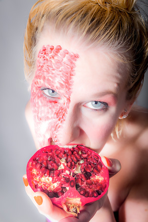 Portrait with a special pomegranate MakeUpの写真素材