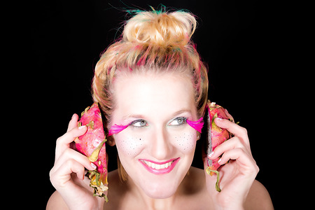 Models with a special MakeUp meets dragon fruitの写真素材
