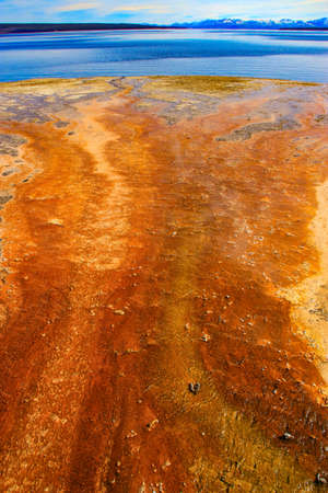 Yellowstone Park is located in Montana, the ground is flooded with hot spring water all year round, and the surface is dyed with sulfur.の写真素材