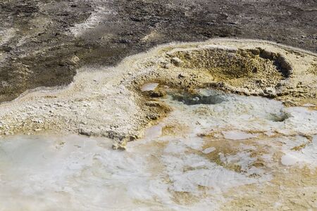 Yellowstone National Park, Wyoming, United States September 20, 2014 â Geothermal activity in Yellowstone seen by the active gaysers on the ground surface.  They are very colorful and and alien.のeditorial素材