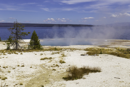 Yellowstone National Park, Wyoming, United States September 20, 2014  Yellowstone Lake in the dying ground in the foreground.のeditorial素材