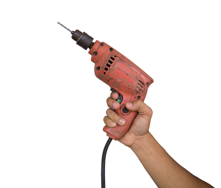 Mechanic screwdriver or drill on hand on white backgroundの写真素材