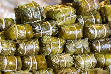 Thai dessert, Khao Tom Mad, steamed sticky rice with bananaの写真素材