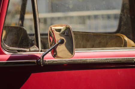 Vintage wing mirror of a old car.の写真素材