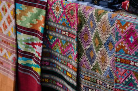 Thai silk is woven using ancient methods of weaving. No machinery Is the traditional weaving of the villagersの写真素材