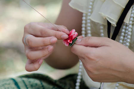 The garland made from flowers is an art and culture of Thailand.の写真素材