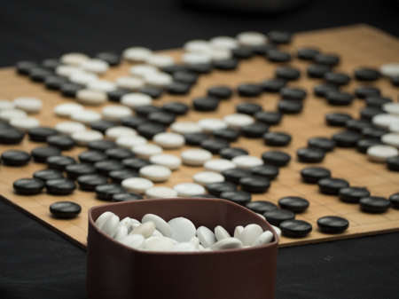 Go game board game that requires cunning to defeat competitors.の写真素材