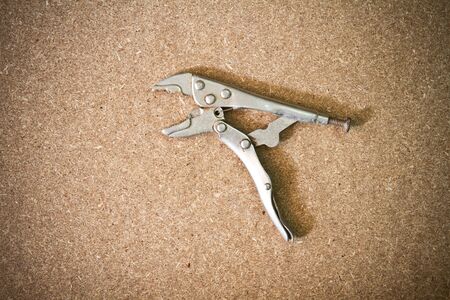 Wrench on wood の写真素材