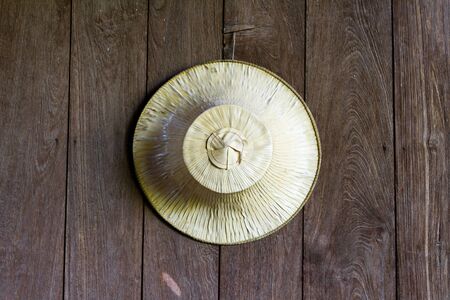 Woven hat with a leaf on の写真素材