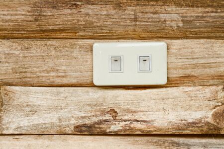 Socket on the wood wallの写真素材