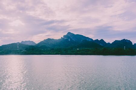 Mountain and the sea on the  morning in Thailandの写真素材