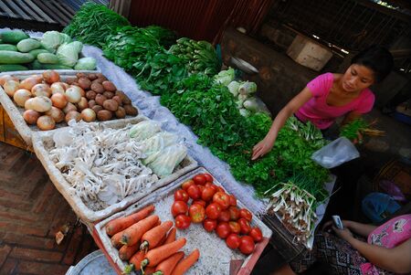 Morning market in loungprabang , laosのeditorial素材