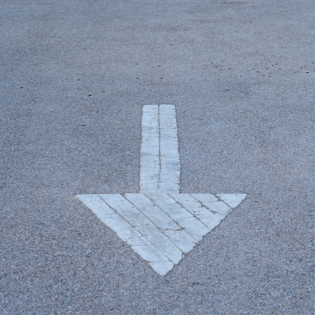 Arrow sign on road