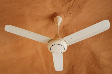 Ceiling fan is connection with EARTHEN HOUSEの写真素材