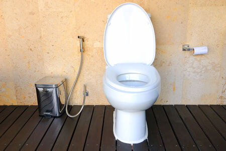 Modern white toilet bowl in a bathroomの写真素材