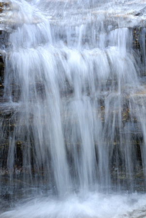 Motion of waterfall as background