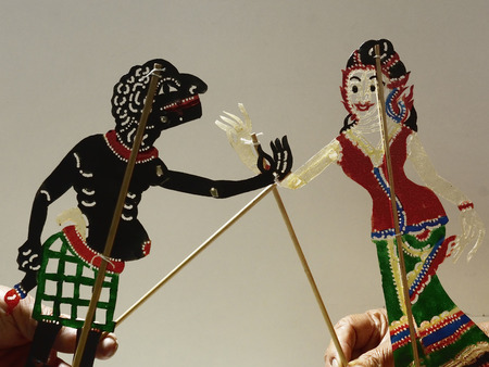 Nang Ta Lung Shadow Play .The cowhide puppets in front of white screen with music and narrativesのeditorial素材