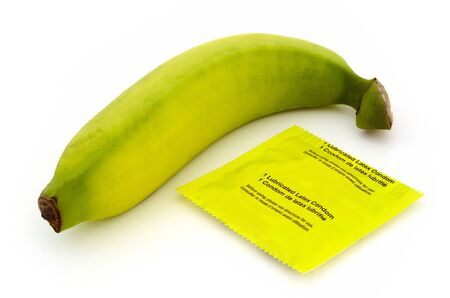 condom banana smell over a white backgroundの写真素材