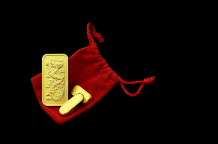 gold bars dragon sculpture isolated on white background for chinese newyearの写真素材