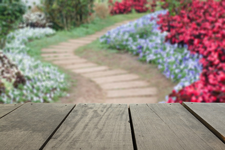 Defocused and blur image of terrace wood and pathway in the park for background usageの写真素材