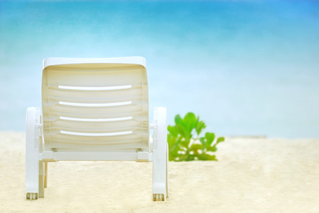 A Chair on the white beach for lonely emotion