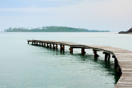 Beautiful seascape in morning time with wood bridge into sea