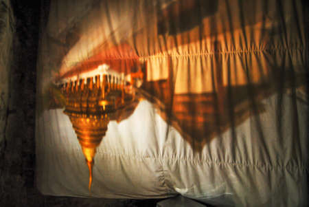 Unseen Thailand ,Flip vertical Pagoda from Lighting reflect to curtain in Lampang ,Thailandのeditorial素材