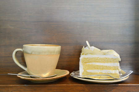 Cappuccino Coffee on Wooden table backgroundの写真素材