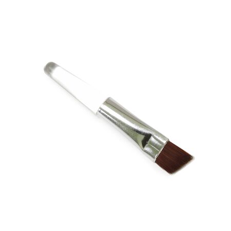 make up with brush isolate on white backgroundの写真素材