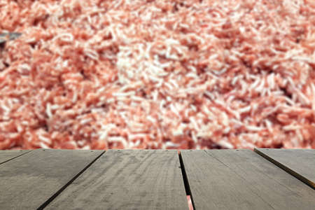 Defocus and blur image with terrace wood of minced pork on fresh pork marketの写真素材