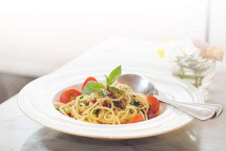 Low angle view of a serving of Italian spaghetti with a meat based bolognese, or bolognaise, sauce...