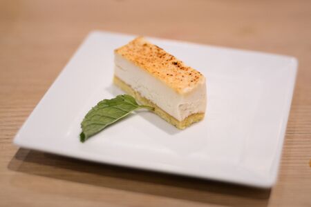 cheesecake on white plateの写真素材