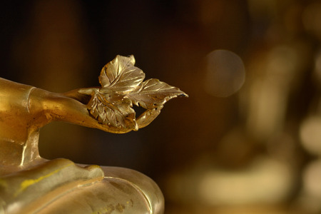 Golden hands of buddish state in the art style ,Wat Krathum Suea Pla temple ,Bangkokの写真素材