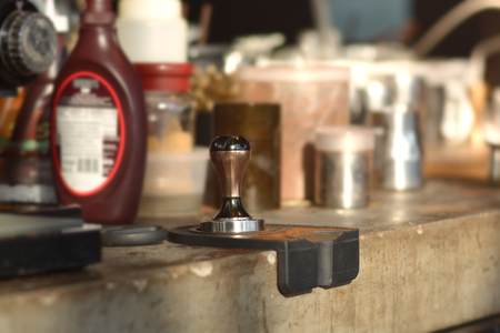 tamper and piston/portafilter machine making espresso coffeeの写真素材