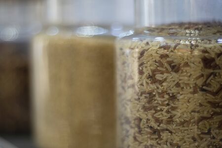 Jasmine brown rice beery in bottle, healthy food and diet concept.