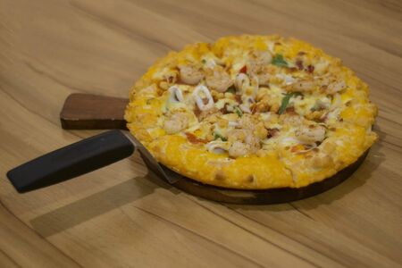Seafood Pizza with cheese edge and cheese toppingの写真素材