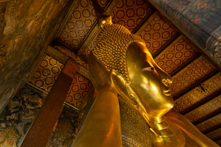 Reclining Buddha statue at Wat Pho,This public temple place is Wat Phra Chetuphon Vimolmangklararam ,Bangkok ,Thailandのeditorial素材