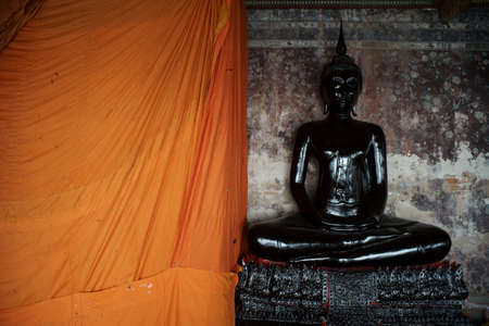 Black Buddhist state underconstruction at Wat Suthat Thepwararam ,This temple is public place and famous landmark tourist attraction in Thailandのeditorial素材