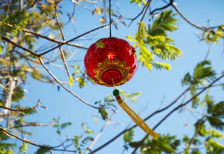 chinese lanterns over clear blue sky