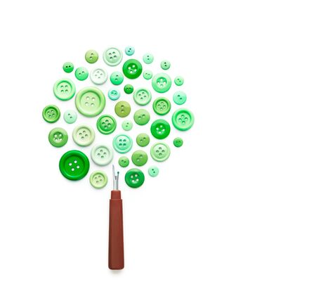 Tree made of sewing buttons and ripper isolated on white backgroundの写真素材