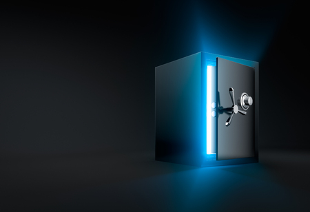 Ray of light shining through an opened safe boxの写真素材