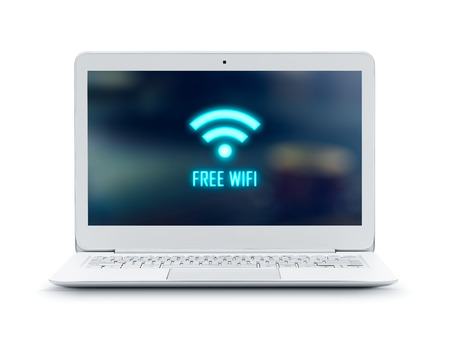 Laptop with Free Wifi logo isolated on white background - Clipping path includedの写真素材