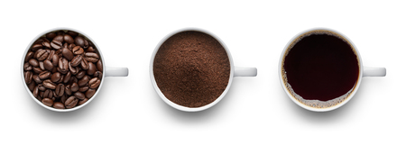 Coffee beans, ground coffee and cup of black coffee over white background