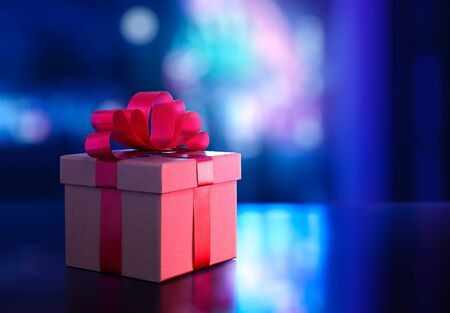 Gift box on blurred bokeh light  with copy space