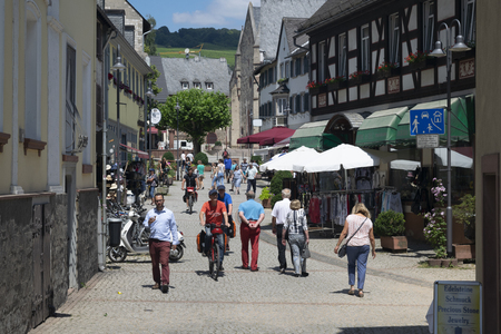 Cochem, Germany - June 26, 2018: Tourists and locals on a sunny summer afternoon. Cochem has just over 5000 residents and was settled in the year 886. There are special streets where no cars are allowed.のeditorial素材